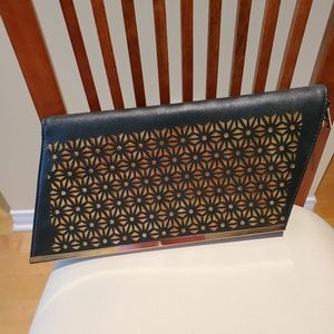 Beautiful gold and black clutch bag